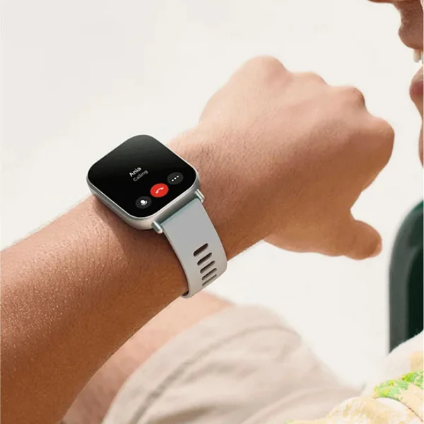 Description (after_intro) - The image is a clear, well-composed lifestyle shot showing the smartwatch in use